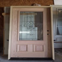 Custom Oak Door with Raised Moulding and Custom Glass